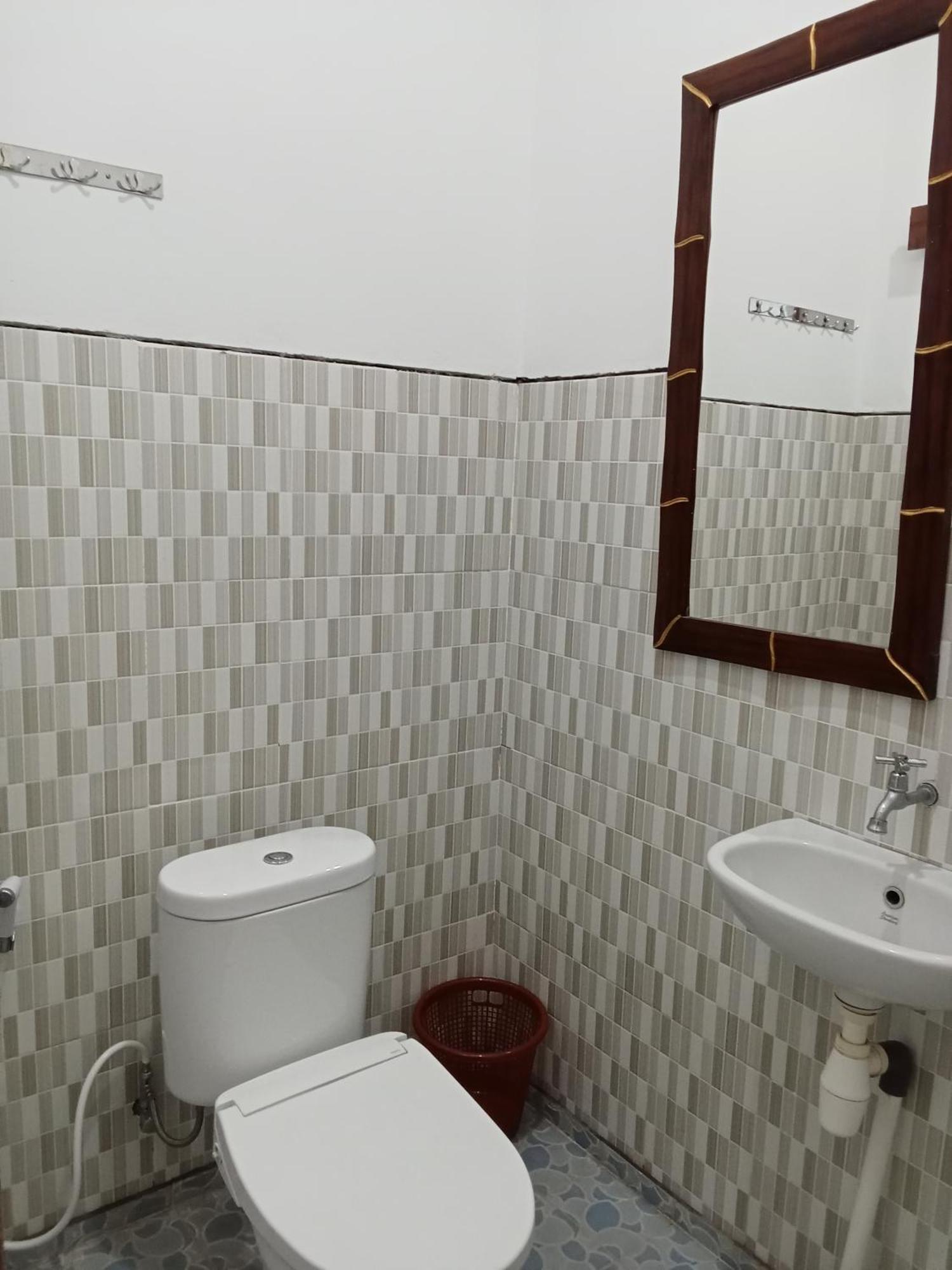 Komang Homestay Amed Esterno foto