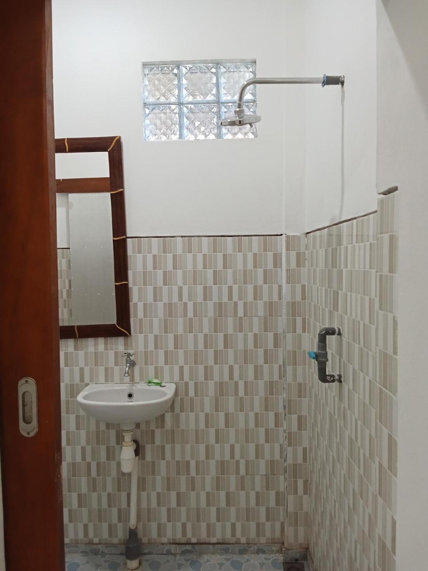 Komang Homestay Amed Esterno foto
