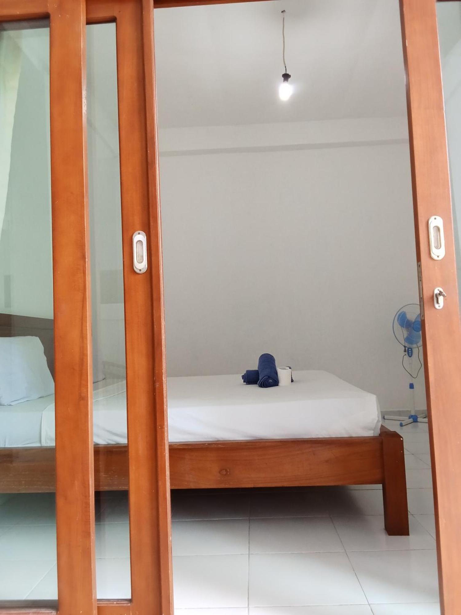 Komang Homestay Amed Esterno foto