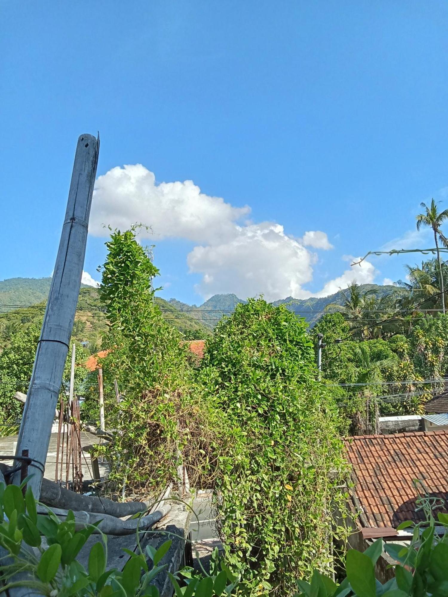 Komang Homestay Amed Esterno foto